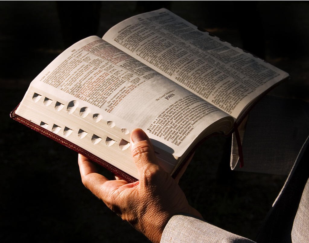 Holding Bible